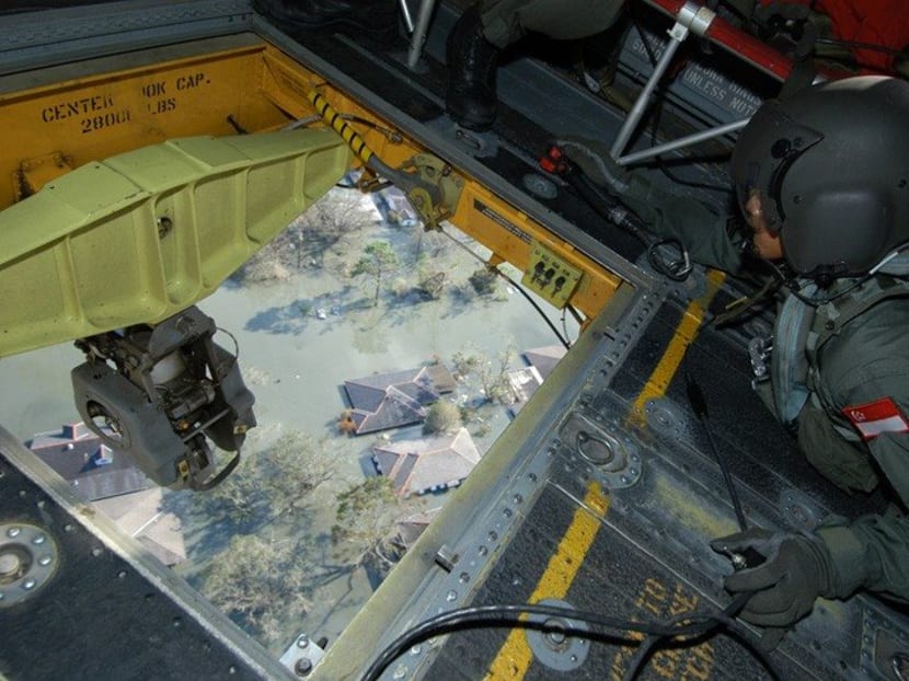 Four Chinook helicopters and 45 personnel from the Republic of Singapore Air Force were deployed when Hurricane Katrina pummeled the United States 12 years ago. Photo: RSAF