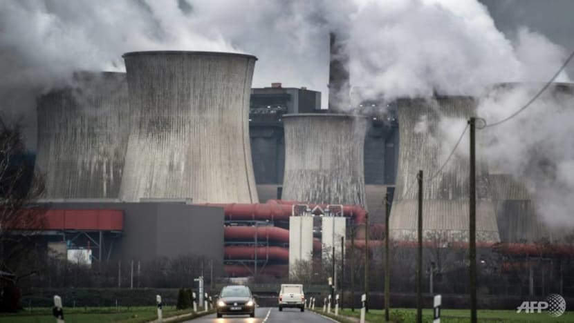 Explainer: Mitigation efforts for a world warming by less than 2 degrees 