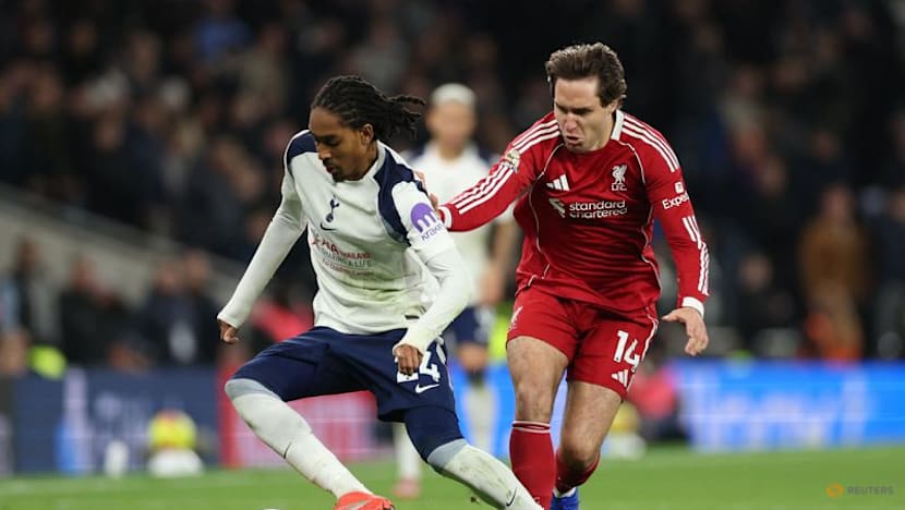 Isak on target but injured as Liverpool hang on to defeat Tottenham
