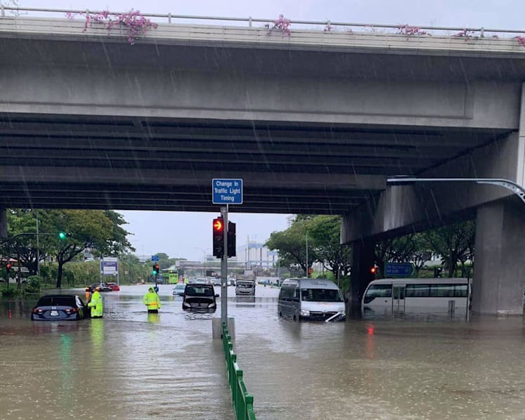Flash floods at Punggol Way, Hougang Avenue 8 due to heavy rain: PUB