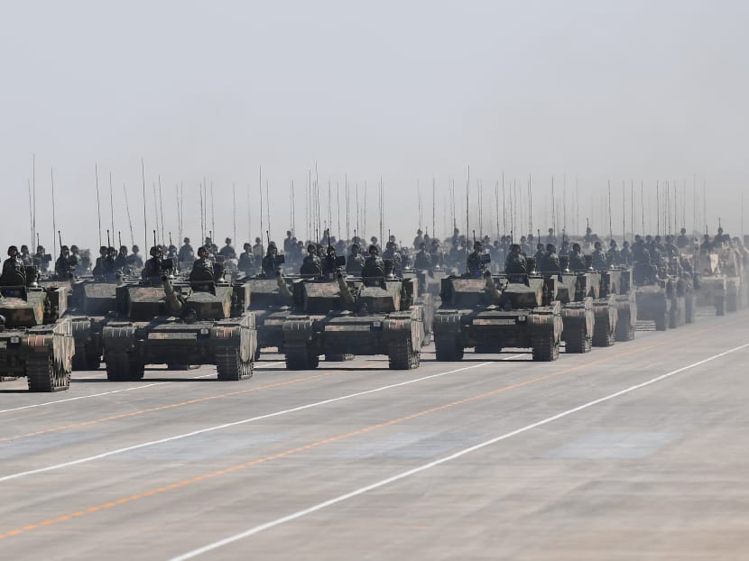 Chinese Type 99A tanks take part in a military parade at the Zhurihe training base in China's northern Inner Mongolia region on July 30, 2017. Photo: AFP