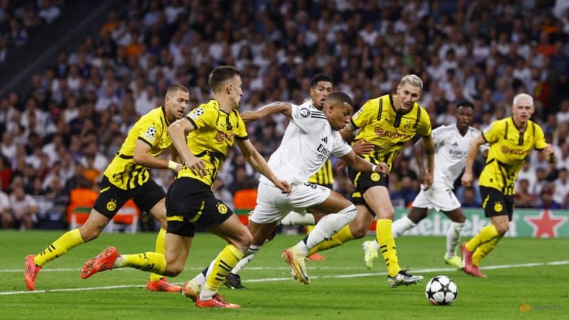 Real's Vinicius grabs hat-trick in 5-2 comeback win over Dortmund Real's Vinicius grabs hat-trick in 5-2 comeback win over Dortmund