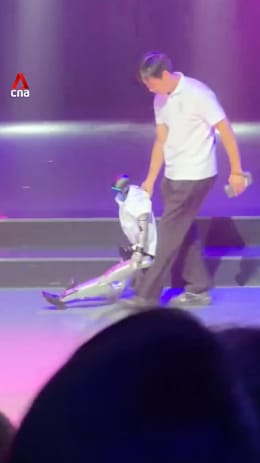 Robot falls during Michael Jackson performance, gets dragged off stage