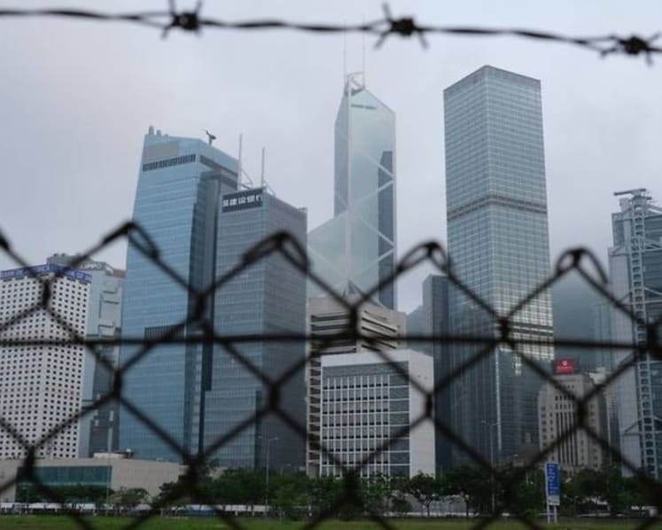 Hong Kong police arrest 5 more in alleged bomb plot