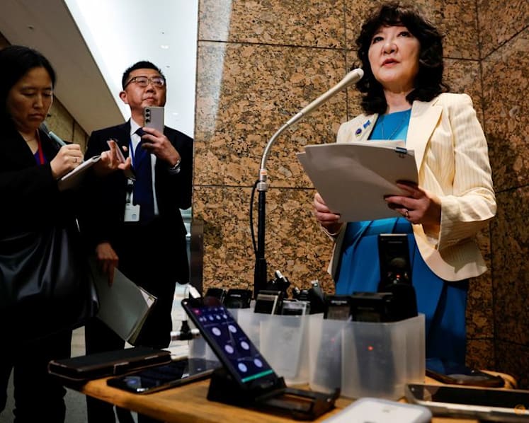 Japan ready '24 hours' to act on currency swings, finance minister says