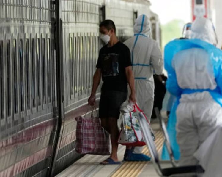 Thailand sends COVID-19 patients to hometowns by train 