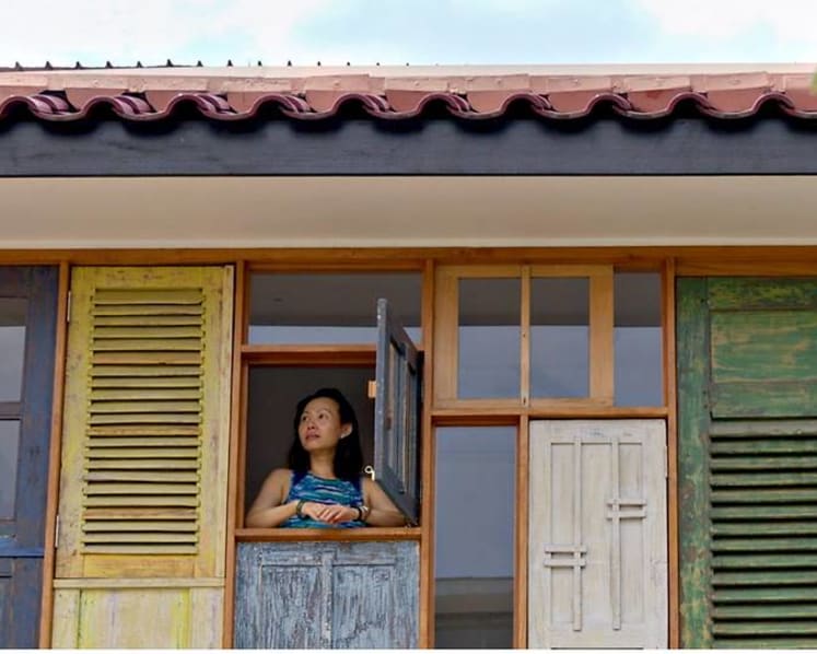 A terrace house in Singapore with upcycled Javanese windows and kampung vibes