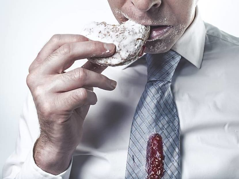 Put down that kueh right now: How to stop snacking in the office