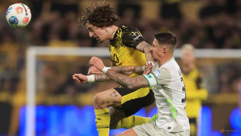 Dortmund ease past Werder 3-0 to stretch unbeaten run