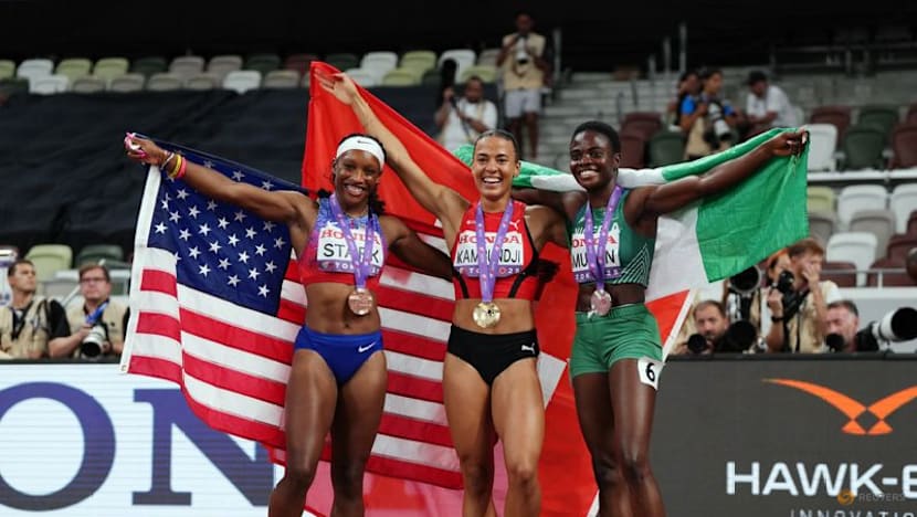 Swiss Kambundji takes shock world 100m hurdles crown