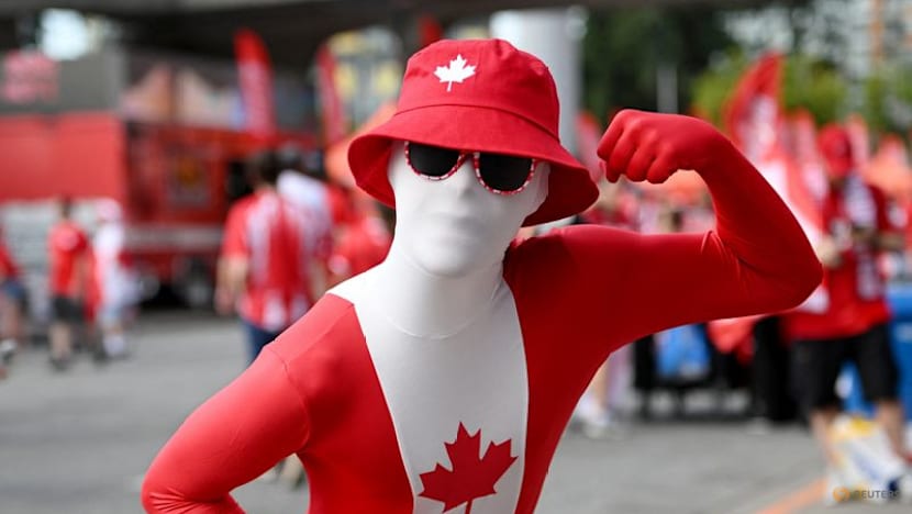 Canada fans on the march turn Vancouver into sea of red and white