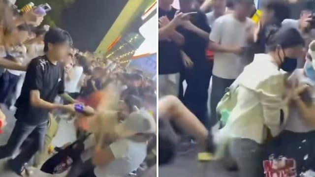 大批男子围堵经纪公司辱骂练习生 女粉丝“护驾”遭泼水飞踹