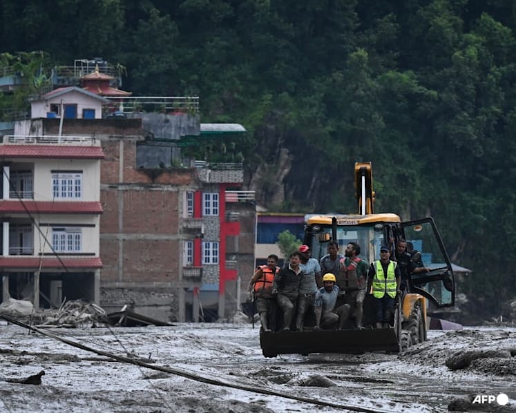 Live: Hundreds missing as rescuers race to find survivors after deadly Nepal-Tibet floods