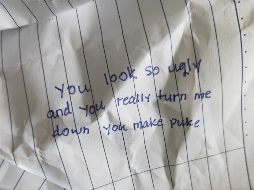 The bullying involved a group of students who had picked on a Malay classmate and handed her notes with insults written on them. The bullying involved a group of students who had picked on a Malay classmate and handed her notes with insults written on them.