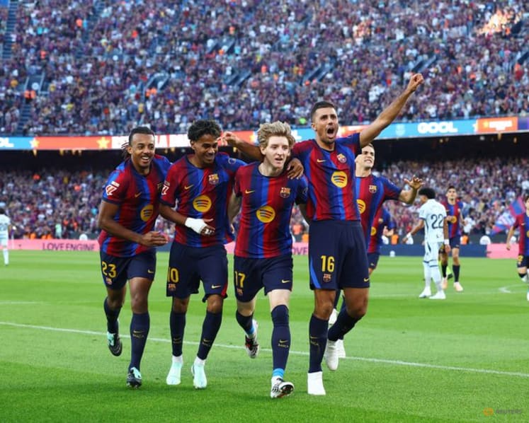 Barcelona cruise past Getafe to maintain perfect start
