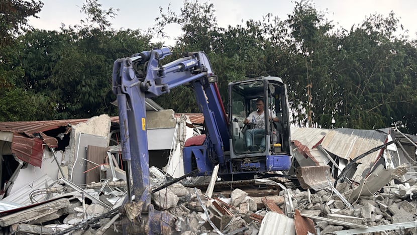 Indonesian authorities demolish luxury prison 'villas' where whisky, TVs seized