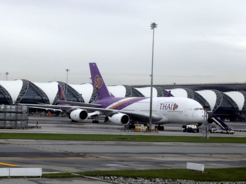 Workers service a Thai Airways Airbus A380-800 aircraft at Bangkok International Suvarnabhumi Airport, Thailand on Sept 3, 2019.