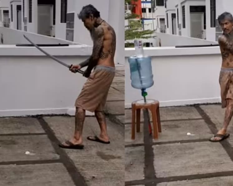Man who posted video of himself slicing bottle with samurai sword charged