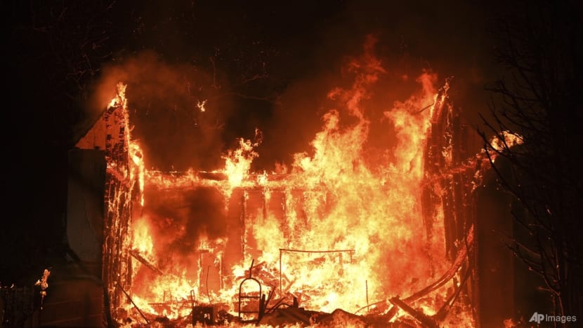 Massive Los Angeles fires rage on even as Hollywood blaze retreats