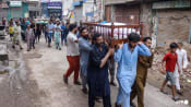 Pakistan flash floods and heavy rains kill 24