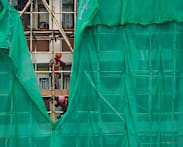 Hong Kong arrests 21 for corruption in building renovation crackdown