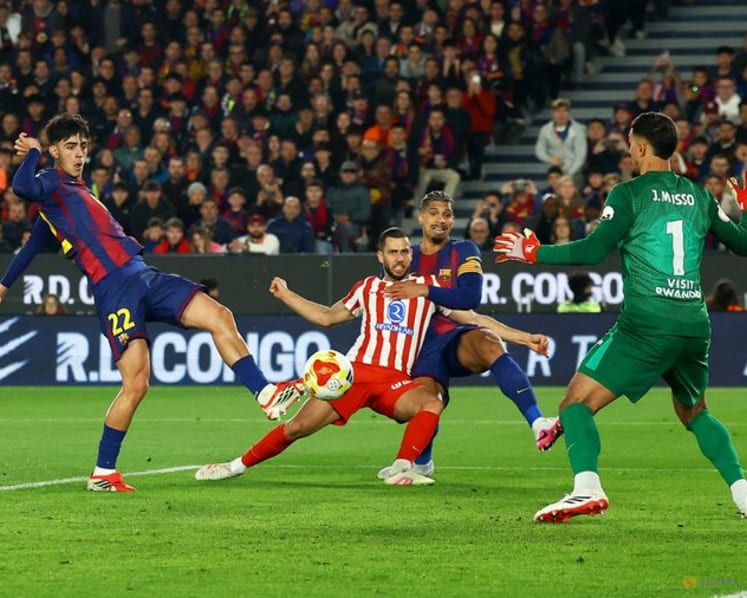 Atletico reach Copa del Rey final despite 3-0 loss at Barcelona