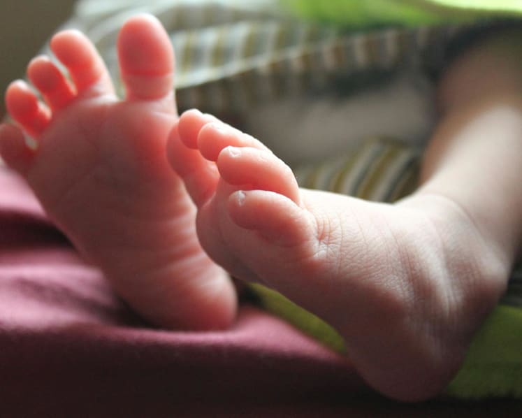 Coroner opens inquiry into death of 1-month-old baby who was sleeping with mother