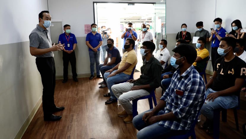 Up to 500 vaccinated migrant workers a week can leave dorms to visit designated areas in pilot to ease curbs