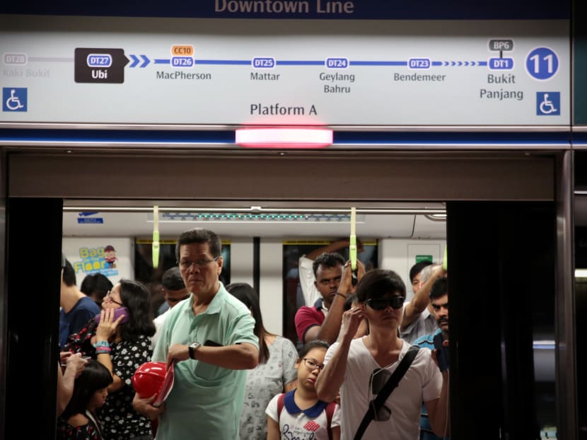 Commuters react during a train delay due to a track fault during the Downtown Line 3 Open House at Kaki Bukit Station. Photo: Jason Quah/TODAY Commuters react during a train delay due to a track fault during the Downtown Line 3 Open House at Kaki Bukit Station. Photo: Jason Quah/TODAY