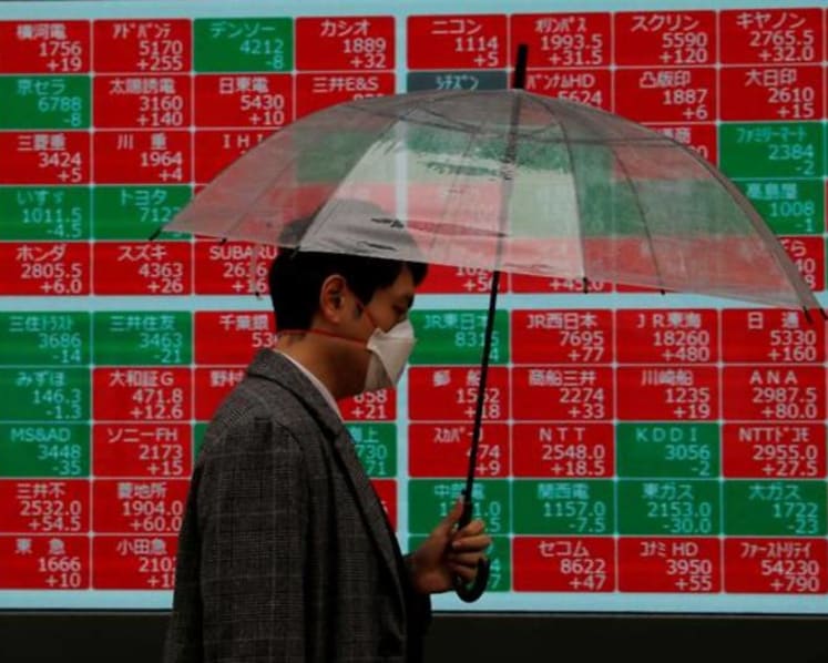Commentary: Should government bailouts restrict stock buybacks?