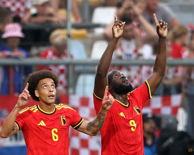 Belgium coach seeks to temper Lukaku fever