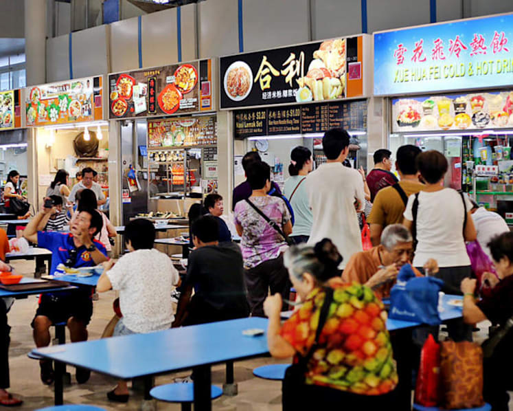 Introduce reusable takeaway containers at hawker centres, with a catch