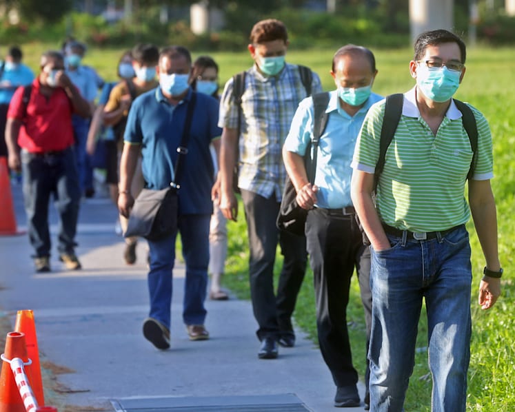 Covid-19: Work permit holders living outside dormitories now included in community cases count
