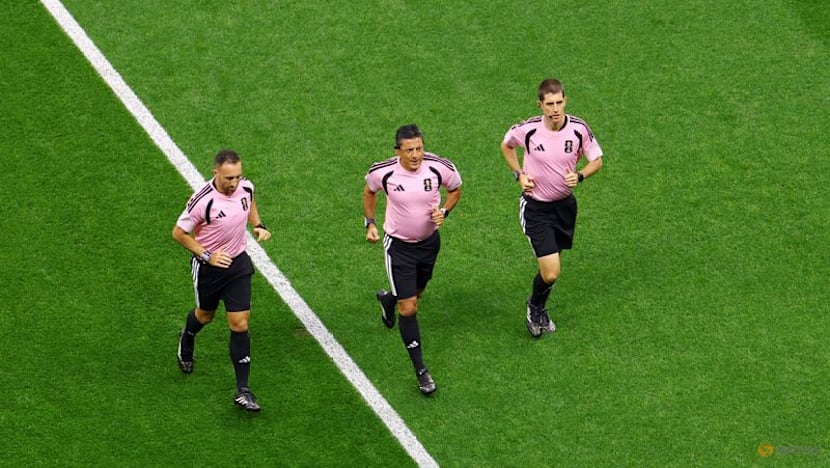 The World Cup's hidden runners: referees keep pace with players and pressure