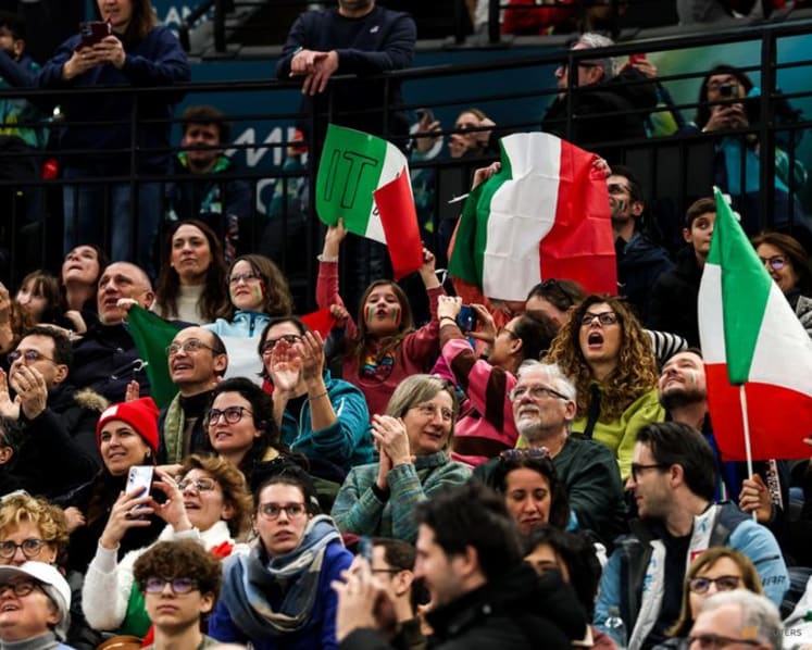Ice hockey-Italy's 'family' team hungry for more after breakthrough win, says coach