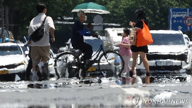 韩国遭热浪侵袭 发布史上首个紧急高温预警