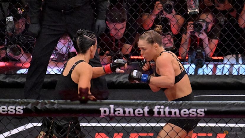 Pioneer Rousey gains redemption with retirement fight win over Carano