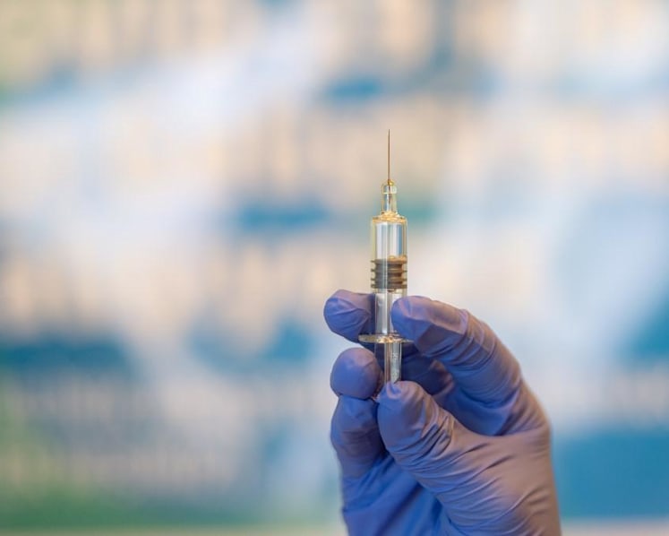 Explainer: Why Covid-19 vaccines may not completely eliminate viral spread
