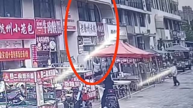 中国两岁女童六米高处坠落 路人徒手接人