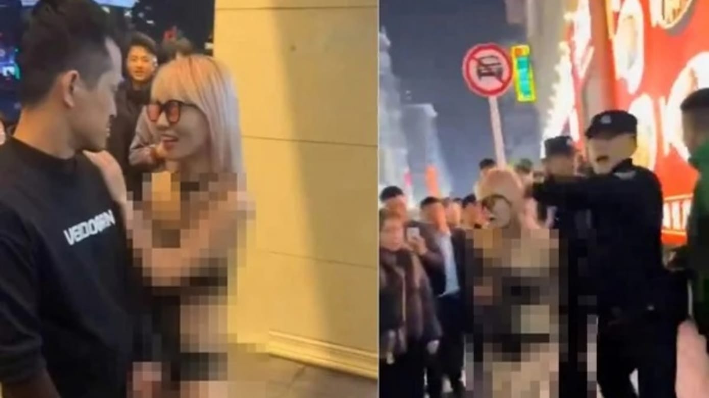 中国性感女当街与男子发生不雅行为 民众未制止反围观起哄