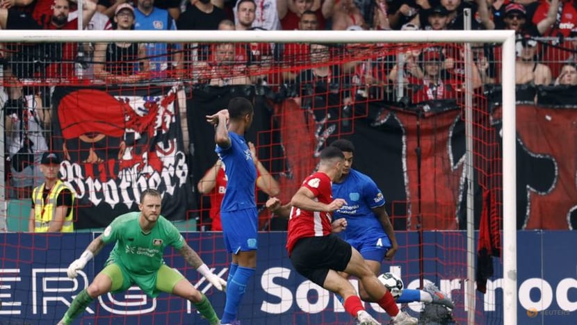 Leverkusen weather hailstorm to thrash 10-man Grossaspach 4-0 in German Cup Leverkusen weather hailstorm to thrash 10-man Grossaspach 4-0 in German Cup