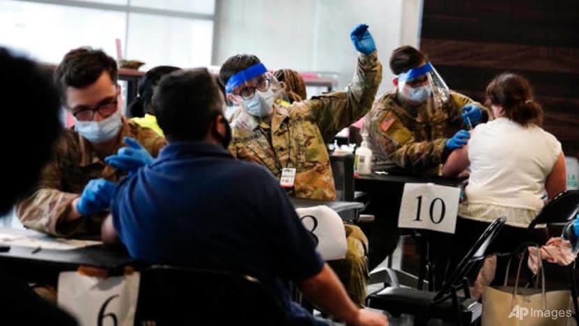 Half of US adults have received at least one COVID-19 shot