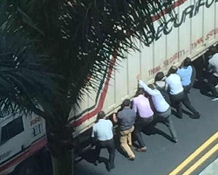 16 honoured for rescuing man pinned under trailer truck