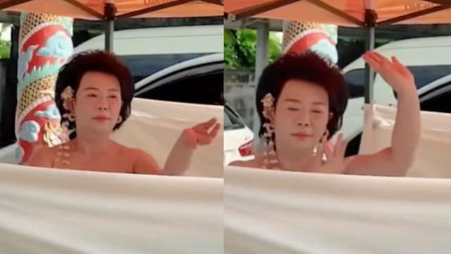 佩通坦下台心愿成真 泰前女议员寺庙前裸舞还愿