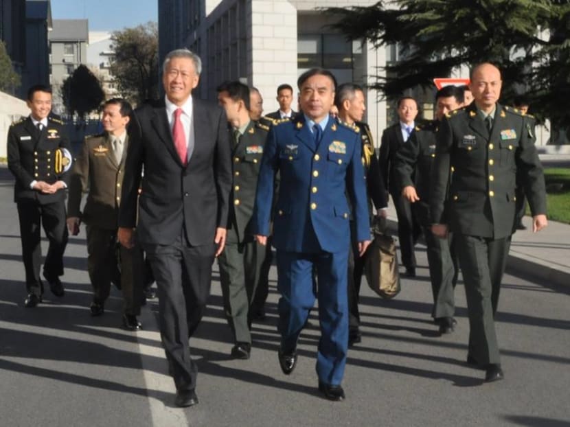 Defence Minister Ng Eng Hen meeting General Liu Yazhou, the Political Commissar of the People’s Liberation Army (PLA) and other commanders at the PLA National Defence University. Photo: Facebook/ Ng Eng Hen-Defence Minister