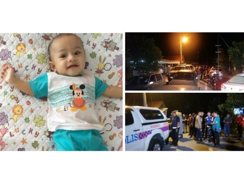 Adam Rayqal Mohd Sufi's body was found stuffed inside the freezer compartment of the fridge at his babysitter's house.