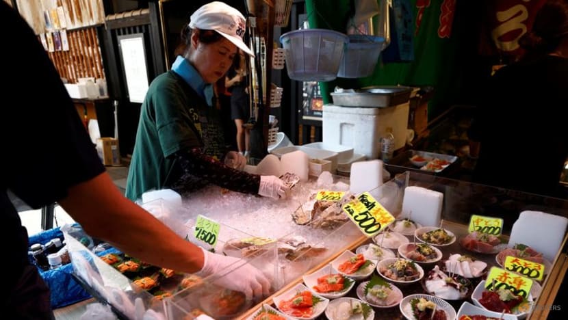 Japan raises economic assessment for first time in 15 months 