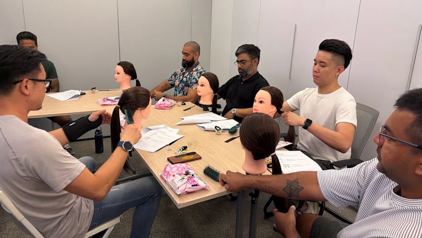 These stay-at-home dads started a workshop to help fathers style their daughters' hair