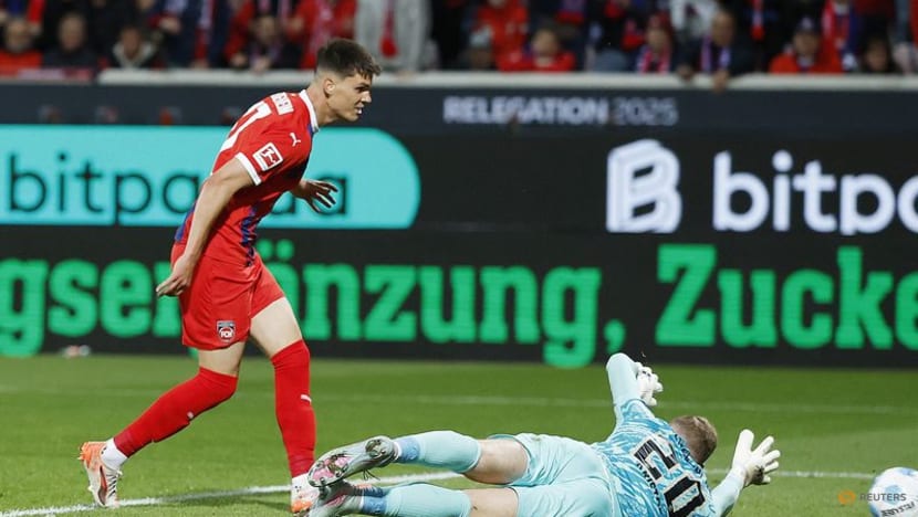 Heidenheim battle back for 2-2 draw with Elversberg in relegation playoff