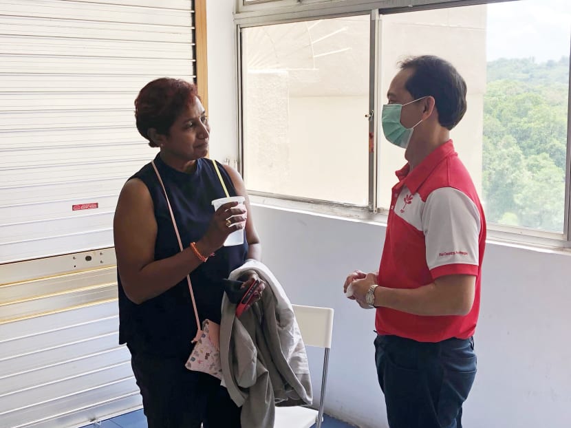 Mr Leong Mun Wai speaking to Ms Kala Manickam at the Progress Singapore Party's headquarters at Bukit Timah Shopping Centre on March 28, 2021. Mr Leong Mun Wai speaking to Ms Kala Manickam at the Progress Singapore Party's headquarters at Bukit Timah Shopping Centre on March 28, 2021.